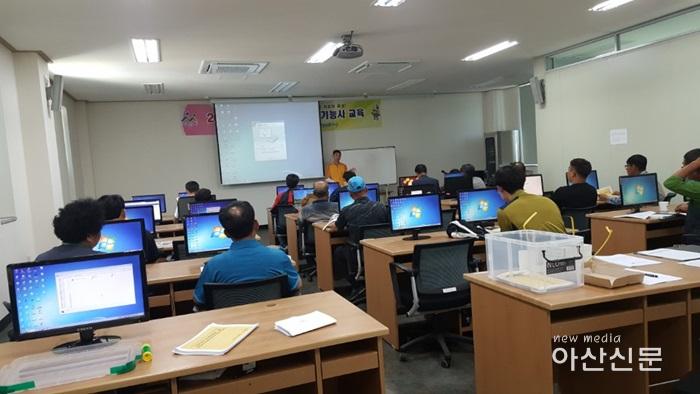 2. 기술지원과, 농기계운전기능사 필기 21명 합격.jpg
